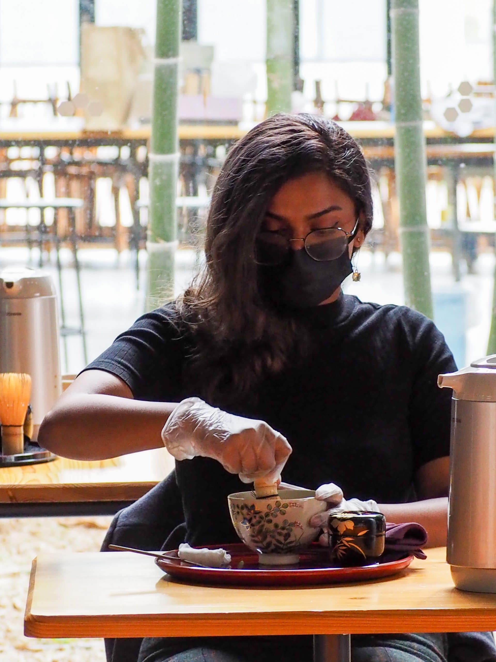 An international student performs tea ceremony