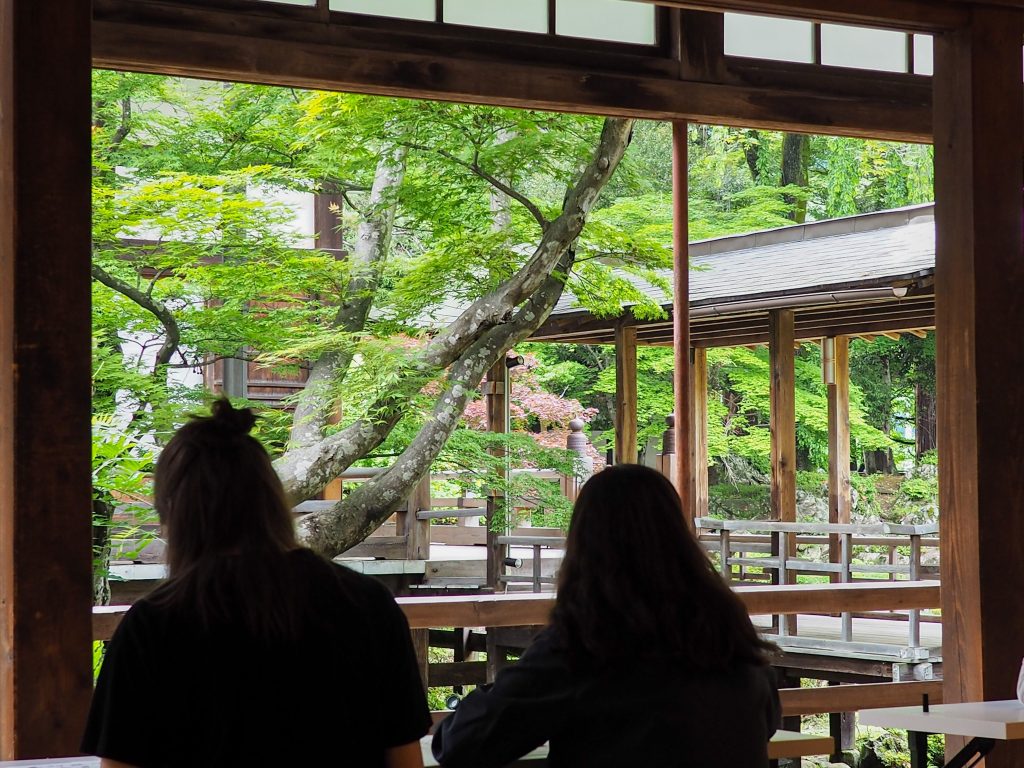 International students practice Japanese calligraphy at Erinji Temple