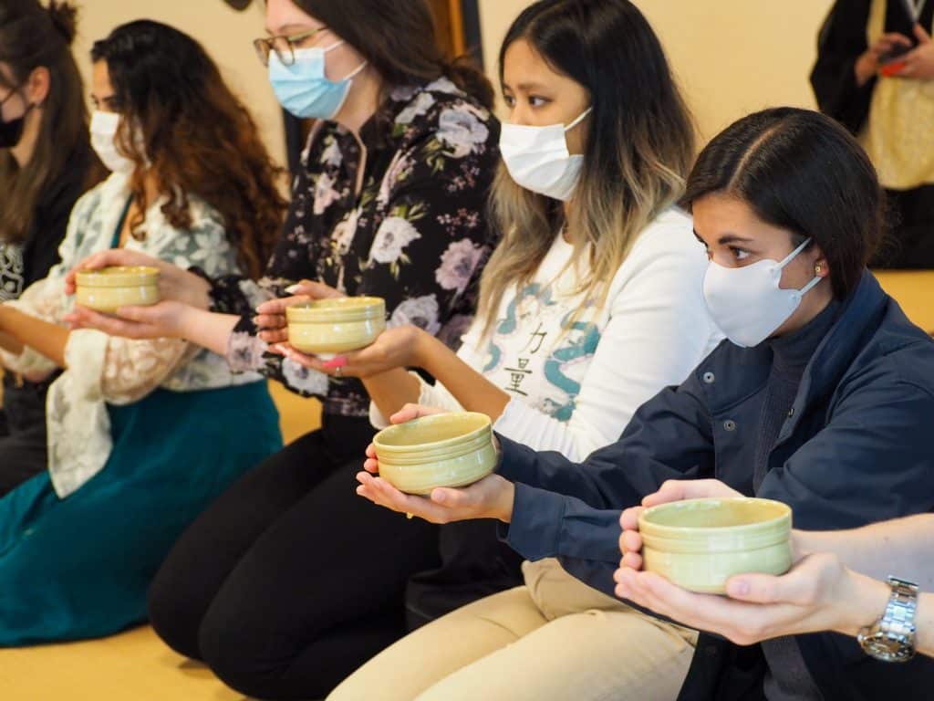 iCLA international students practice tea ceremony  