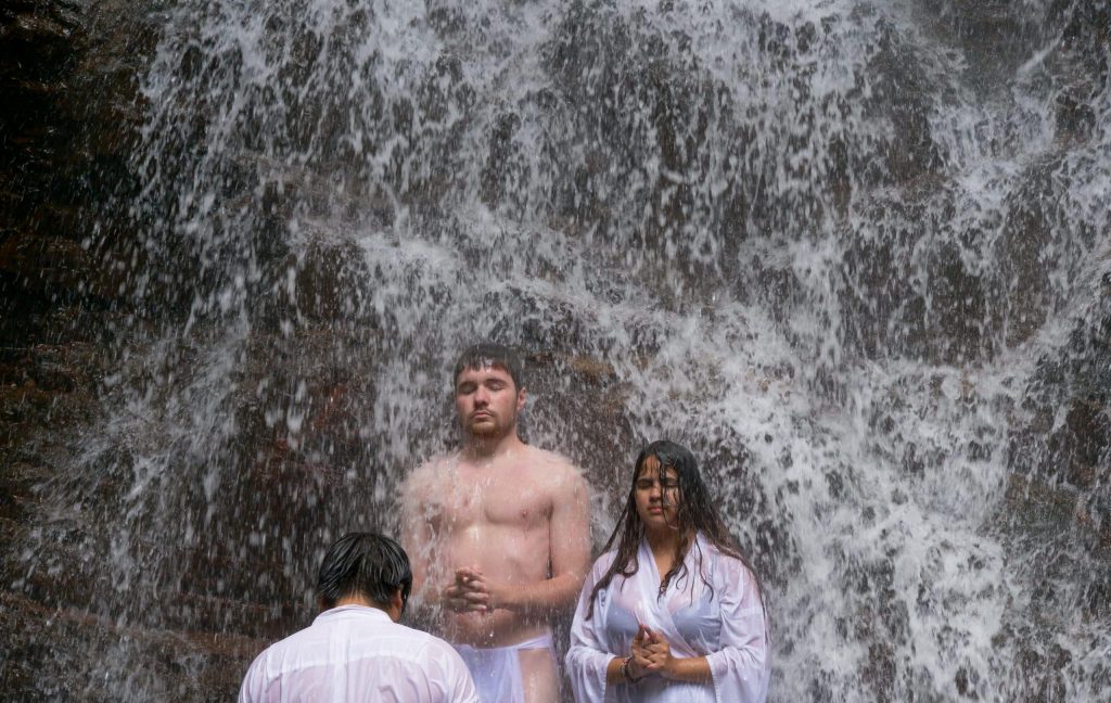 iCLA students doing Shugendo waterfall training at Kawaguchi Asama Shrine's Haha no Shirataki