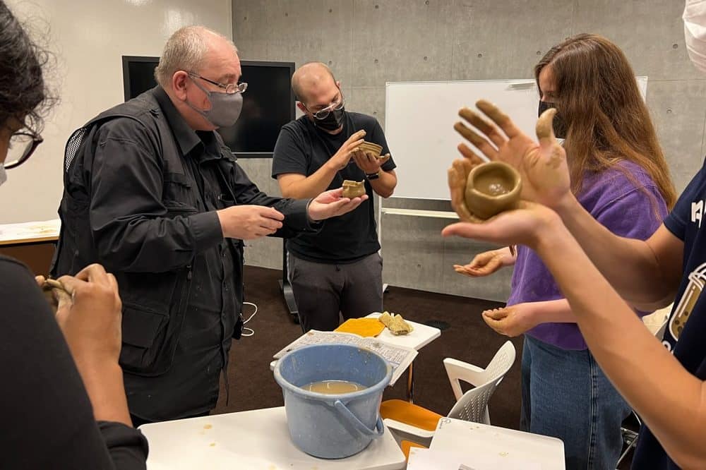 iCLA students making pottery