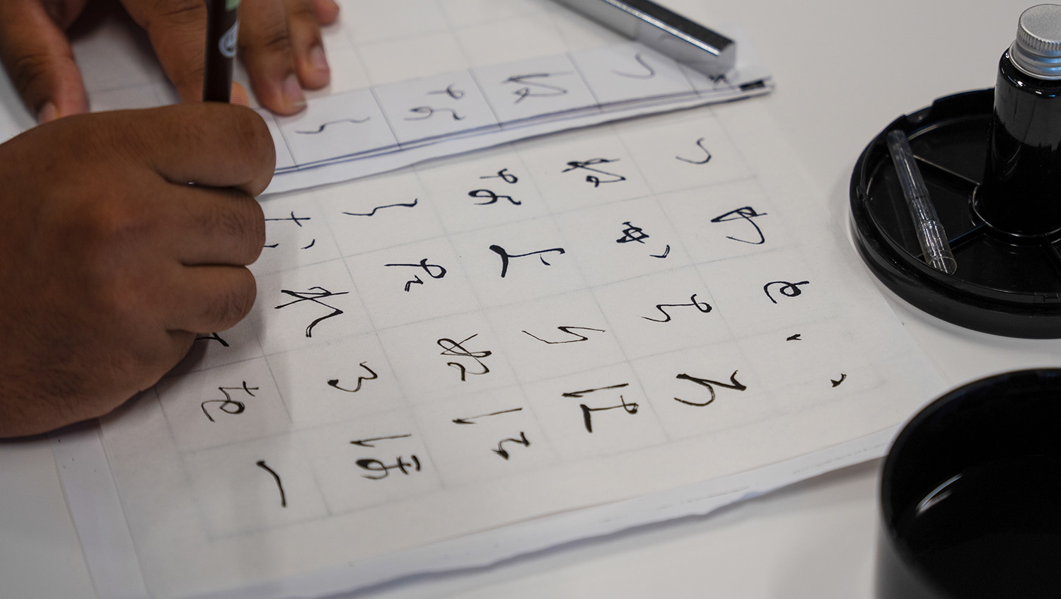 iCLA Student writing Japanese Calligraphy