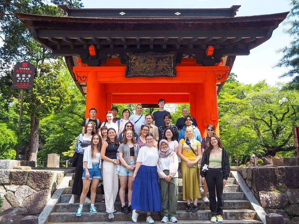 iEXPerience participants stand in front of Erinji gates 