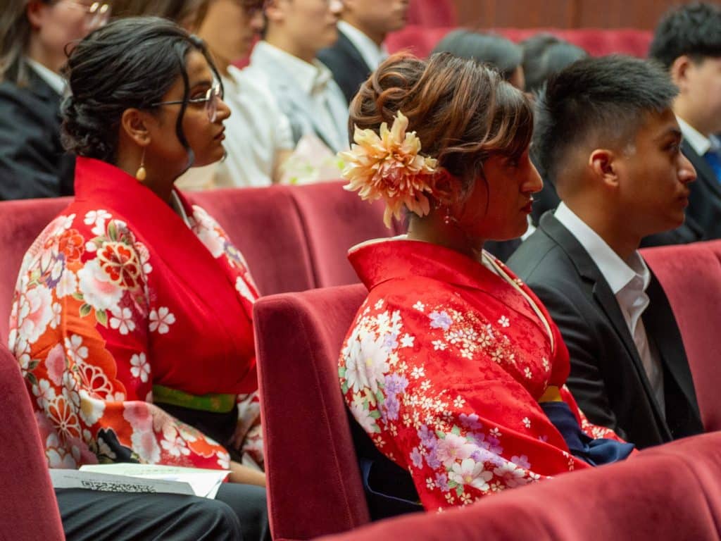 iCLA students listen to speeches in the Fall 2023 Graduation Ceremony.