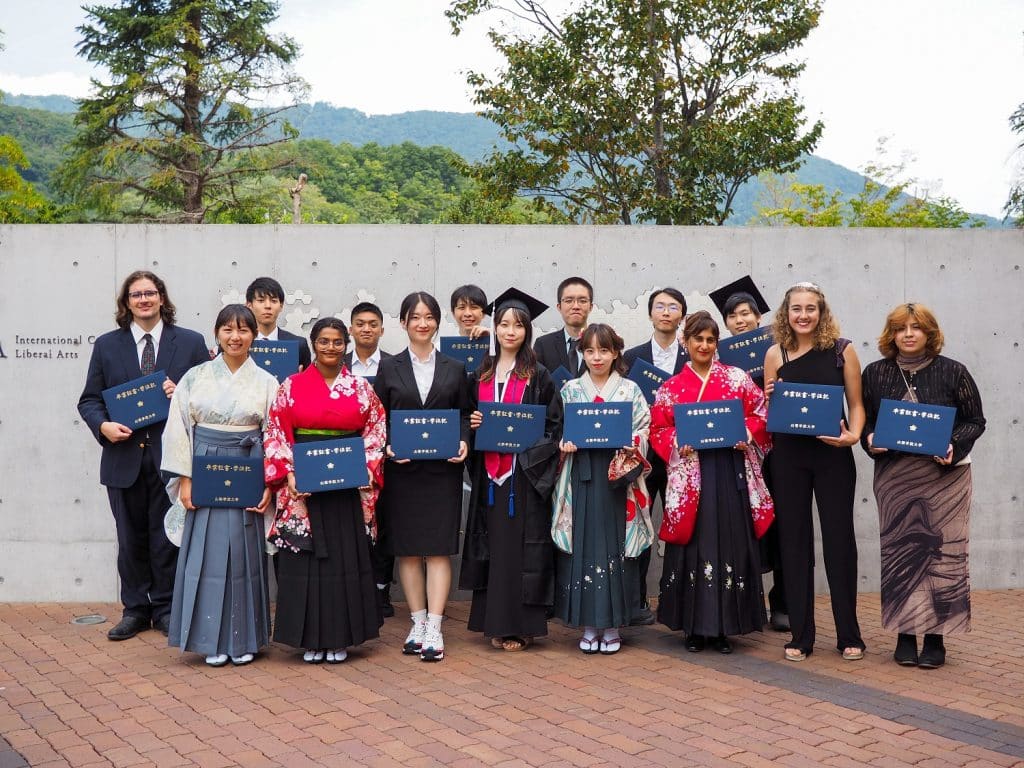iCLA Students pose with their graduation certificates after the Fall 2023 Graduation Ceremony 
