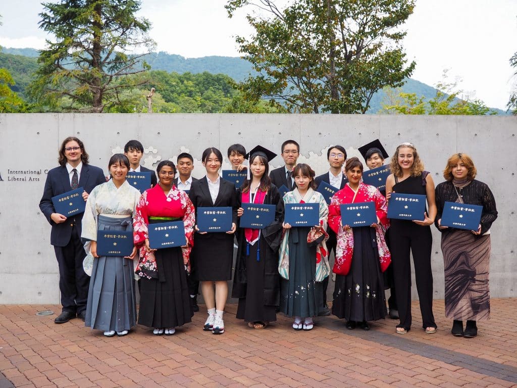 iCLA Students pose with their graduation certificates after the Fall 2023 Graduation Ceremony