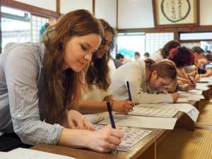 iCLA international students practice Shakyo at Erinji Temple.