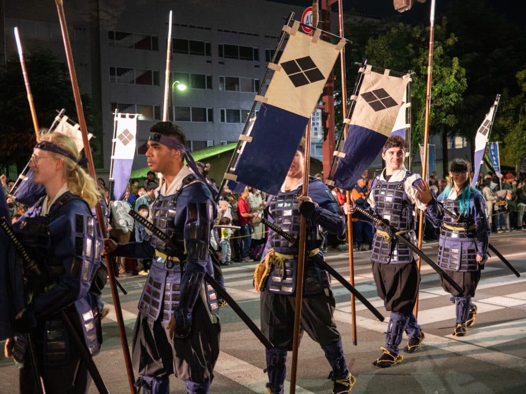 iCLA students walk in the Shingen-ko Festival.