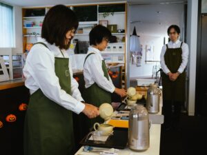 Professionals from the Japanese Tea Instructor Association prepare tea for the Japanese Tea Award tea tasting.