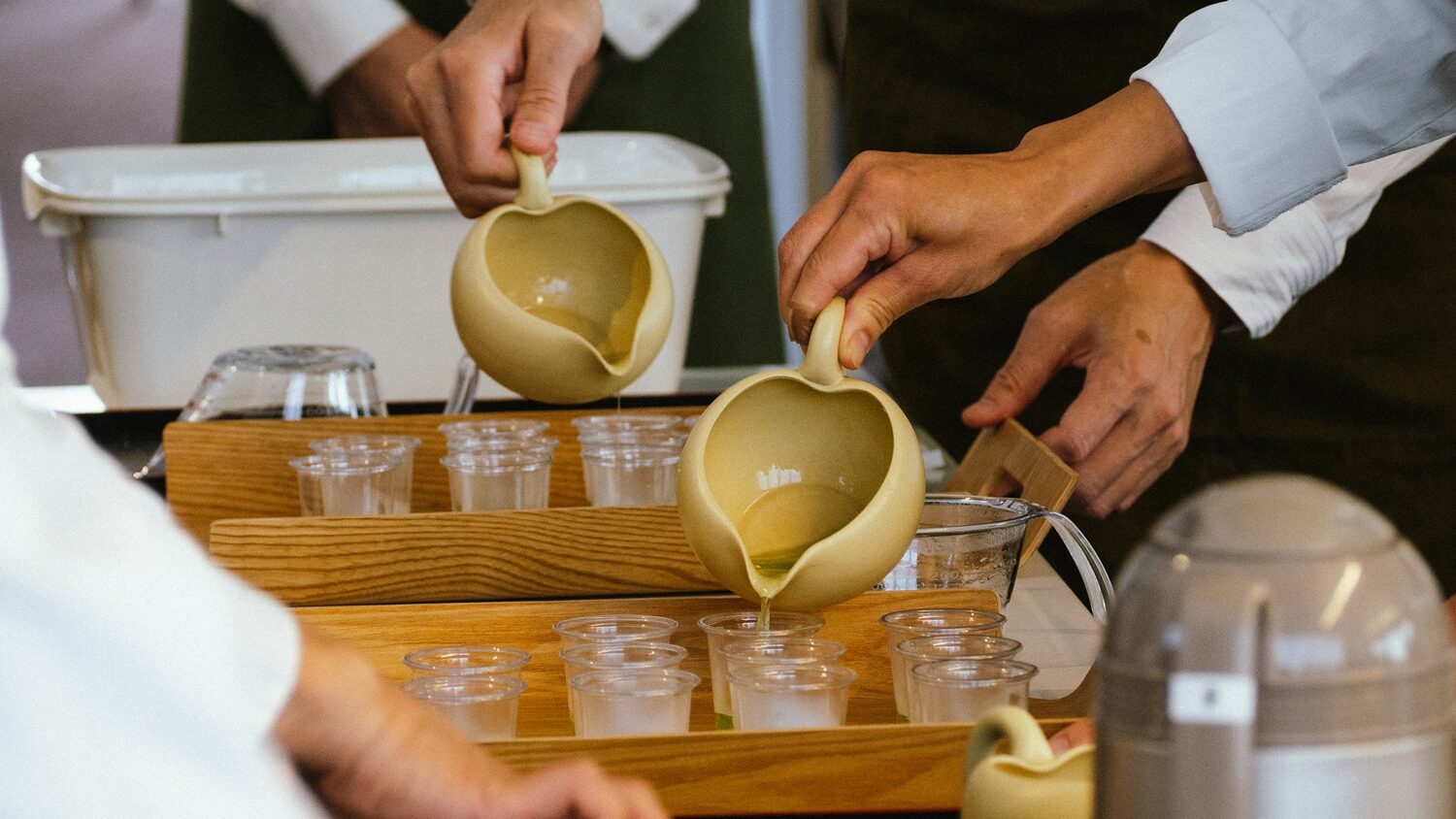 Professionals from the Japanese Tea Instructor Association prepare tea for  the Japanese Tea Award tea tasting.