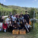 Students who attended the iEXPerience Program for Viniculture in Yamanashi take a group photo together at Monde Winery.